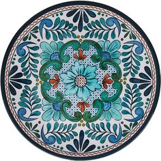 a decorative plate with blue and green designs on the front, sitting on a white surface