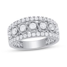 a white gold ring with round diamonds