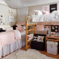 a dorm room with bunk beds and pink decor