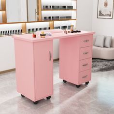 a pink vanity table with drawers in a room