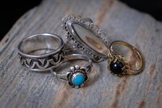 "These rings are vintage handcrafted and were restored by me. The Vintage Mexican Sterling Silver band is size 7 and is 8mm tall. It is stamped \"925\".  The Vintage Abalone and Sterling Silver Pendant Ring measures 31mm tall and 13mm wide. The band is 10g and the back is stamped \"Guad Mex 925 - R G\". Size 7.5. The Vintage Bell Trading Post Turquoise Ring is stamped \"Sterling\" and is size 5.75. The gold plated ring has a black tourmaline set in a 12g band. Ring is stamped \" 18kt hge espo\" Vintage Handmade Ring Jewelry, Handmade Vintage Ring Jewelry, Handmade Vintage Style Ring, Vintage Handmade Oval Turquoise Ring, Handmade Vintage Oval Turquoise Ring, Handmade Vintage Turquoise Oval Ring, Vintage Handmade Stackable Rings As A Gift, Vintage Handmade Stackable Rings As Gift, Vintage Handmade Stackable Rings For Gift