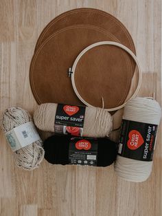 yarn, twine and other items laid out on the floor