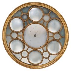 a round mirror with many circles on it