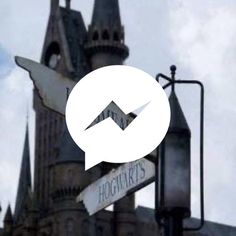 a white speech bubble with hogwart's castle in the background and a street sign