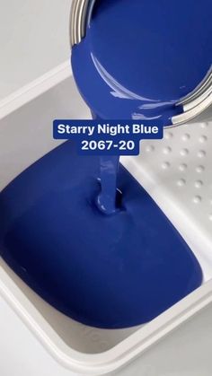 the blue paint is being poured onto the white tray with the words starr night blue 2016 - 20