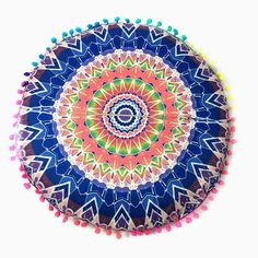 a colorful plate with pom poms on it