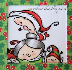 a christmas card with an image of santa and elves