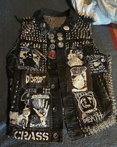 Introducing our Punk Rock Leather Studded Vest - a must-have for fans of edgy fashion! This Vest features a striking combination of Gothic patchwork, Cramps-inspired design, and an opulent Motorhead aesthetic. Perfect for fans of Lemmy and Cannibal Corpse, this outerwear piece is both a tribute to punk rock icons and a bold fashion statement. Key Details: - Eye-catching Suicidal Tendencies patch on the front. - A collection of impressive badges and patches, carefully curated for a punk-inspired Patchwork Fashion, Style Vest, Punk Inspiration, Stud Style, Moto Style