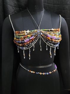 Details: - Includes : Bralette and Waist Chain Both - Materials: Natural Gemstones, Crystals & Alloy chain - Size: Please select the size appliable, and message for any clarification. - Customization: Available upon request - Shipping: Usually ships within 3-5 working days, with delivery in 8-15 days; If need earlier, please select expedited shipping at checkout and feel free to reach out to us for any clarification. Care Instructions: - Avoid contact with water and harsh chemicals - Store in a Beaded Bralette, Bead Threading, Body Chain Fashion, Beaded Bra, Bead Bra, Mermaid Top, Festival Rave Outfit, Festival Attire, Mermaid Core