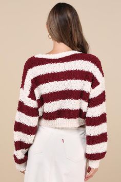 Weekend OOTDs are destined to be adorable with the Lulus Easy Charisma Ivory and Red Striped Boucle Cropped Sweater! Soft, boucle-like chenille yarn shapes a loose knitted fabric with a classic striped design throughout. Long sleeves with drop shoulders frame a crew neckline, atop a relaxed-fit bodice that ends at a lightly cropped hem. Ribbed knit accents the neckline, cuffs, and hem. Fit: This garment fits true to size. Length: Size medium measures 16" from shoulder to hem. Bust: Great for any Casual Red Cropped Long Sleeve Sweater, Trendy Cropped Striped Sweater, Red Long Sleeve Cropped Sweater, Red And White Striped Sweater, Sweater With Stripes, Playful Long Sleeve Red Sweater, Boucle Sweater, Chenille Yarn, Cropped Sweater