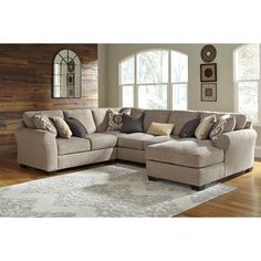 a living room with a large sectional couch