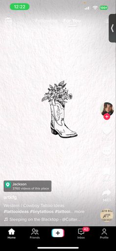 a drawing of a boot with flowers in it