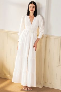 FINAL SALE! NO RETURNS. NO EXCHANGES. Georgia Maxi Dress will make a lasting impression at your next spring event! With an elastic waist, long sleeves, and tiered peasant skirt. LENGTH: 52" from top of shoulder FABRICATION: 100% White Linen STYLE#;DR-21450 White Linen - WHITE-S24 *Dry Clean or wash on cold and hang flat to dry *Model is wearing size XS Dress Outfits Party, Georgia Dress, Peasant Skirt, Yumi Kim, Spring Event, Linen White, Daytime Dresses, Linen Maxi Dress, Linen Style