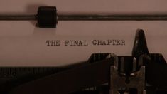 an old fashioned typewriter with the words the final charter on it's paper