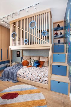 a bedroom with a bunk bed and stairs in the wall, next to a rug on the floor