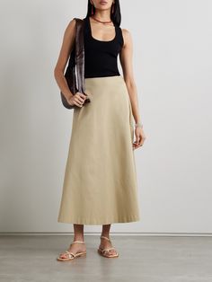 Matteau's maxi skirt is so minimally and faultlessly designed, you'll never run out of ways to style it. Made in Australia from certified organic cotton-blend twill, it has a flowy, A-line shape that sits high on the waist and looks chic styled with a simple tank or collared shirt. Affordable Cotton Skirt For Daywear, Tan Maxi Skirt Outfit, Summer 2024 Trends, Maxi Skirt Outfit, Net Sustain, Dressing Well, Glamorous Fashion, Cotton Midi Skirt, Maxi Skirt Outfits