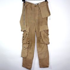 Undercover Japan Mens Small 26 X 25 Cargo Pants Rare Grail N1170 Size Small Waist Laying Flat 26 Inseam 25 Leg Opening 11 Outseam (Overall Length) 36 *Please Take Note Of The Distress Starting On The Crotch Area Of The Pants *Please Take Note Of The Possible Stain Spots (Unsure If Removable) Measurements Are Approximate Pit To Pit : - Length From Bottom Of Collar : - Sleeve Length (From Shoulder Seam) : - Shipping Item Will Be Shipped Out 1 Business Day After The Payment Is Made (Excludes Weekend And Holidays) Vintage Straight Leg Pants With Multiple Pockets, Vintage Straight Leg Bottoms With Multiple Pockets, Brown Urban Cargo Pants, Military Parachute Pants With Cargo Pockets, Military Streetwear Cargo Pants With Side Pockets, Military Cargo Pants With Pockets For Hunting, Military Camouflage Parachute Pants With Pockets, Small Waist, Cargo Pants