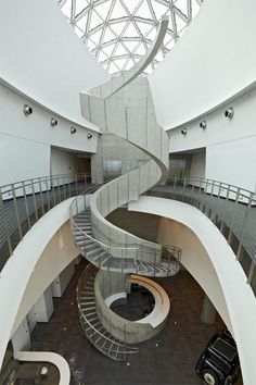 a spiral staircase in the middle of a building