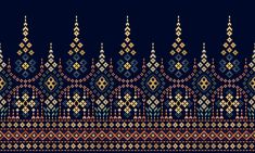 an embroidered pattern in blue and orange colors on a dark background with gold trimmings