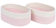 two pink and white baskets sitting next to each other