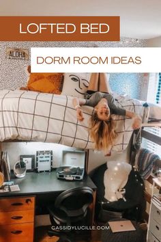 a woman laying on top of a bed next to a desk