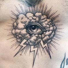 a man's chest with an all seeing eye in the clouds and lightning bolt