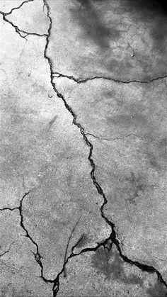 cracked concrete with cracks in the middle