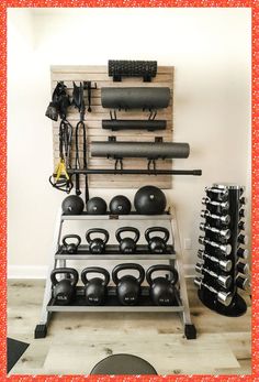 there is a rack full of kettles and exercise equipment