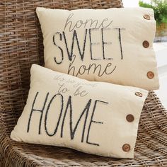 two pillows that say home sweet home and we'll be home on the same pillow