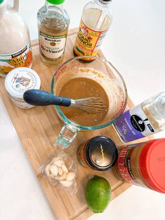 ingredients to make chocolate cake sitting on a cutting board