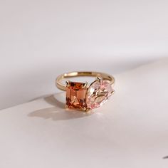 Toi et Moi Solid Gold Emerald Cut Orange Sapphire & Pear Cut Pink Sapphire Engagement Ring/ Double Stone Wedding Ring/ Gift for Girlfriend The pics show 2CT Emerald Cut Orange Sapphire <6*8 mm> & 2CT Pear Cut Pink Sapphire <7*10 mm> 🥰 Details: Center Stone: Emerald Cut Orange Sapphire & Pear Cut Pink Sapphire ⭐ Cut: Excellent ⭐ Grade Color: D color ⭐ Clarity: VVS1 clarity ⭐ Carat and Dimension: Emerald Cut Orange Sapphire & Pear Cut Pink Sapphire: 1 Carat <5*7 mm> +  1 Carat <5*8 mm> 2 Carat <6 Peach Engagement Ring, Orange Stone Ring, Engagement Ring Double, Pink Sapphire Engagement Ring, Stone Wedding Ring, Peach Sapphire Engagement Ring, Pink Sapphire Engagement, Pinky Finger, Cut Orange