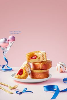 a table topped with lots of different types of desserts