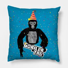 the gorilla is wearing a party hat and holding a sign with confetti on it