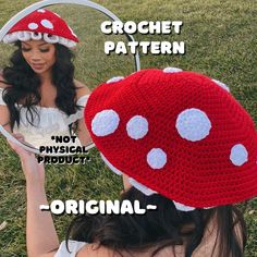 a woman wearing a red and white crochet mushroom hat