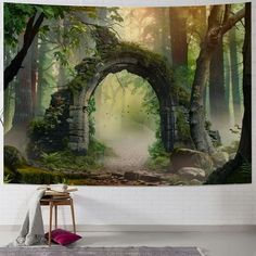 a wall hanging in a room with a forest scene