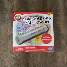 an advertisement for a tool that is on top of a wooden table with the words make your own kaleidoscope