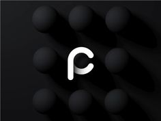 the letter c is surrounded by balls in black and white, as well as an image of