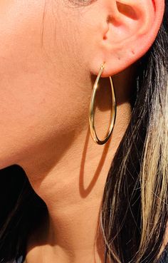 One of our best selling hoops! A lightweight statement pair perfect for everyday wear. 18kt Gold Filled Large Hoop Earrings Tarnish resistant- hypoallergenic- Lightweight Hoop Size: 50mm Width: 3mm Clasp: Hinged  Material: 18 Karat Gold Filled, Hypoallergenic. Tarnish Resistant. Gold-filled does not de-laminate or peel like Gold plated Jewelry nor does it tarnish as readily as silver. Generally speaking, gold filled is better quality and will have a much longer lasting color than plated jewelry. We recommend keeping abrasive chemicals away from the jewelry for the items to last. Thank you for visiting and supporting our small business! We hope you will find a stylish piece that speaks to you! ♥ All of our piece our carefully curated and handmade by our all-female team in Miami, Fl ♥ Our ma Trendy Teardrop Tarnish-resistant Hoop Earrings, Everyday Small Hoop Teardrop Earrings, Hypoallergenic Dangle Hoop Earrings, Nickel-free Teardrop Hoop Earrings, Simple Gold Hoop Earrings, Gold Filled Hoops, Earrings Dainty, Alessandra Ambrosio, Large Hoop Earrings