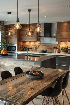 a wooden table sitting in the middle of a kitchen