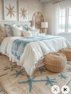 a bedroom with starfish rugs on the floor and bed in front of it