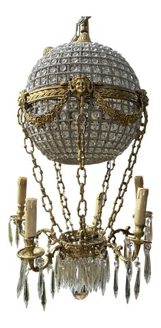 an antique chandelier with crystal beads hanging from it