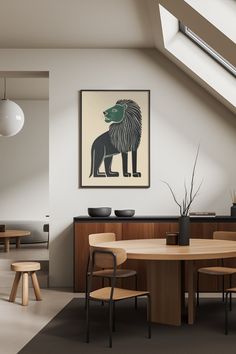 a dining room table with chairs and a poster on the wall above it that says lion