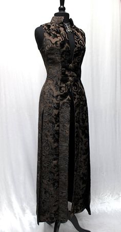 "Gorgeous raiment. A dramatic women's cassock coat made in lush dark coffee brown velvet print fabric. Sleeveless with a classic stand-up collar and a slimming fit. Slits in the back sides and front for flowing ease of movement. Fastens in front with two ornate bronze buckles and lined on the inside in sleek black satin. Comes in sizes Small-3X T. O. D. I. E. F. O. R :) Size measurements: Small - Chest 34\" Waist 30\" Hips 38\" Medium - Chest 36\" Waist 32\" Hips 40\" Large - Chest 38\" Waist 34 Dark Coffee, Brown Velvet, Coffee Brown, Cosplay Outfits, Small Chest, Historical Fashion