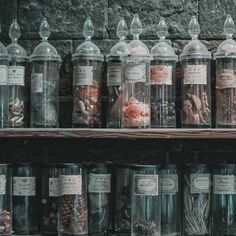 many jars filled with different types of candies