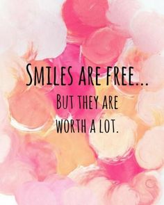 the words smile are free but they are worth a lot on pink and yellow paint