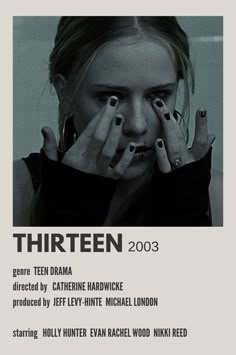 a woman with her hands on her face in front of her face and the words thirteen 2003