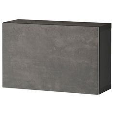 a large gray box sitting on top of a white floor