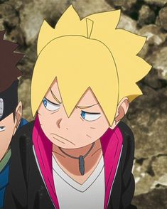 two young men with blonde hair and blue eyes are staring at something in the distance