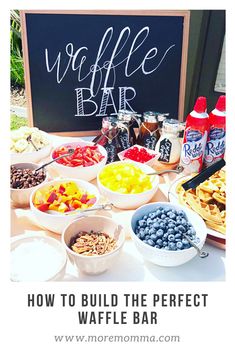 a table full of different types of food with the words waffle bar on it