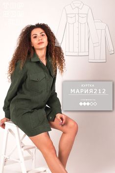 a woman sitting on top of a white stool wearing a green shirt dress and matching heels